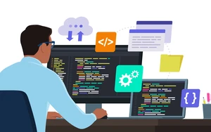 © iStock.com/elenabs
Source: iStock.com/elenabs Man sitting in front of a PC and coding